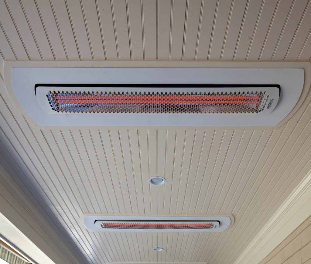 White Electric Heater Recessed into Ceiling on Porch