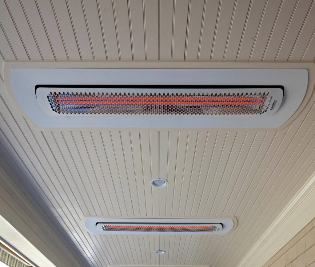 White Electric Heater Recessed into Ceiling on Porch